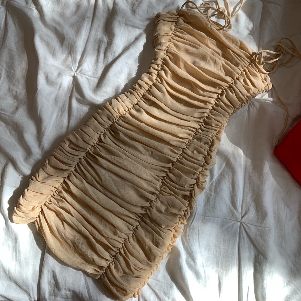Nude smocked mini dress